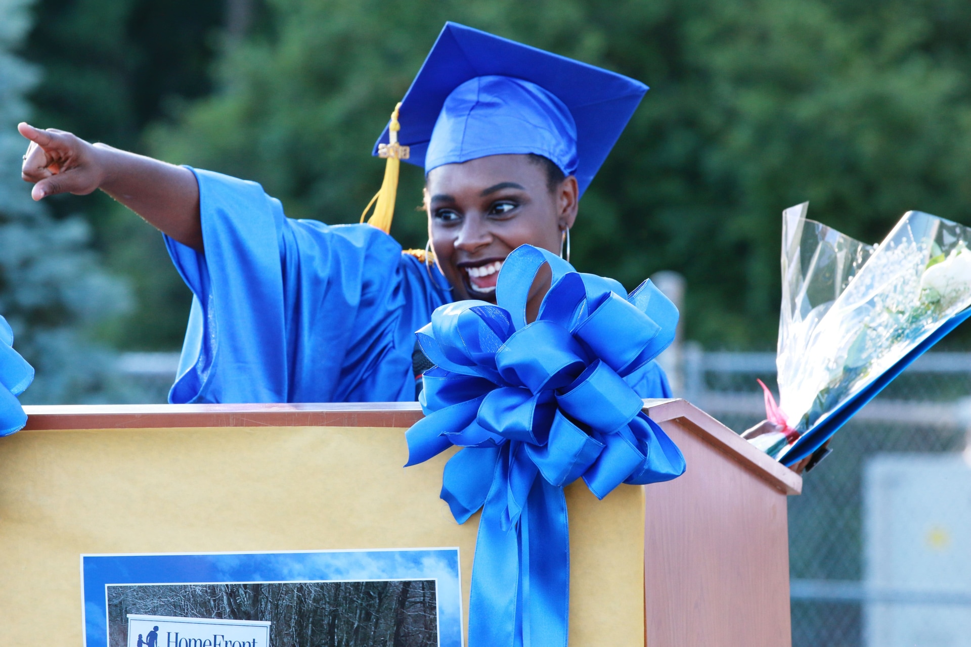 a person in a graduation cap and gown