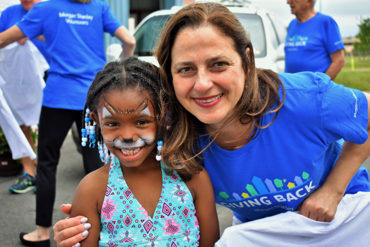 a person and child with face paint