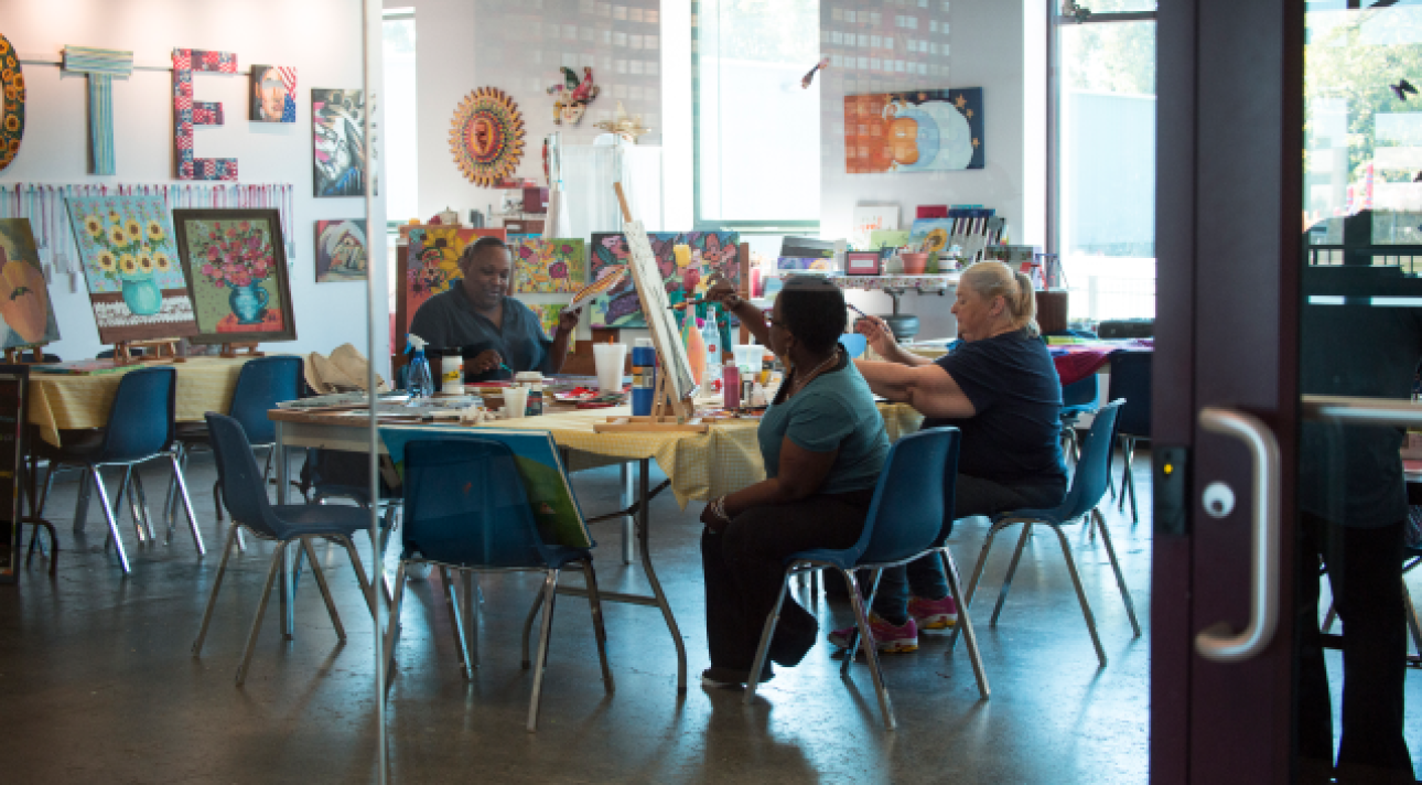 a group of people sitting at a table